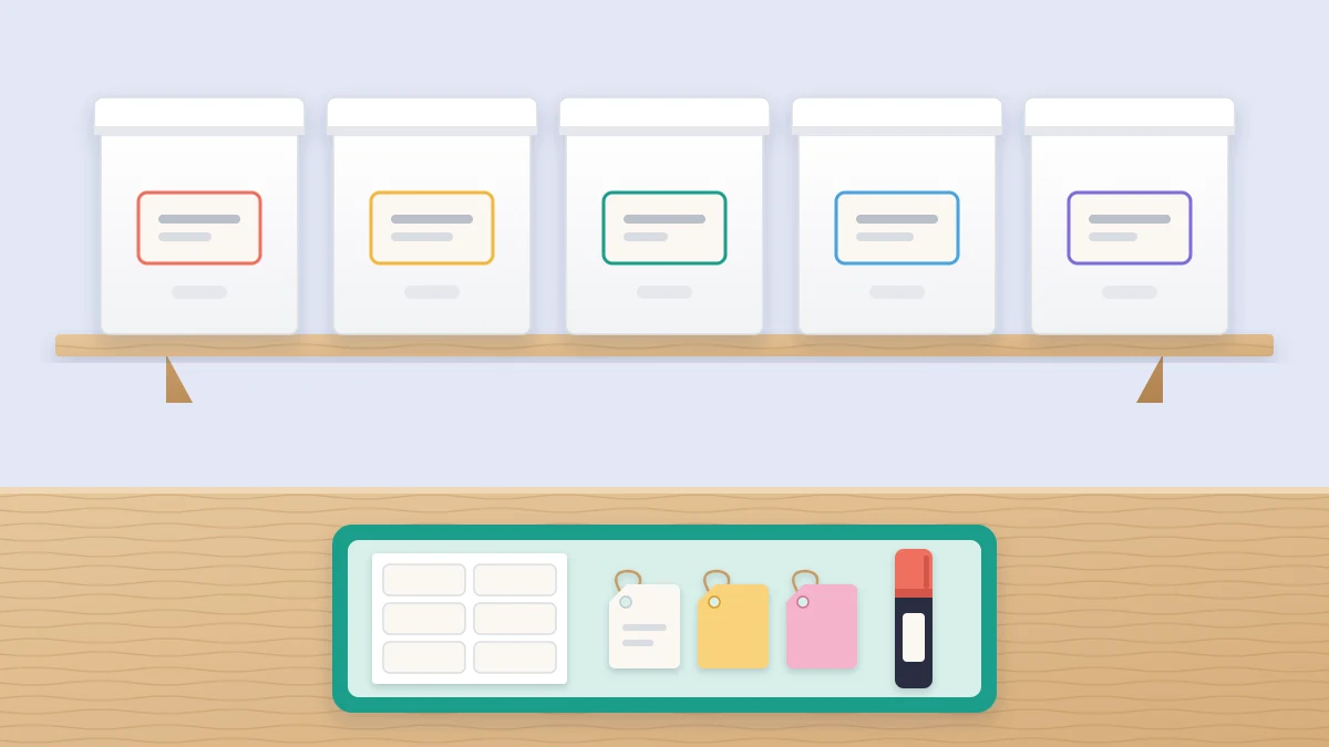 A row of matching white storage boxes with blank labels in the same spot, beside a tray of adhesive labels, tags and a marker