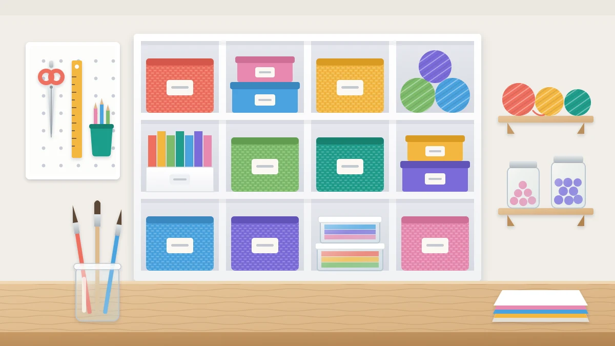 A tidy craft room corner with a white cube shelf unit of colorful fabric bins and a clean work table in front