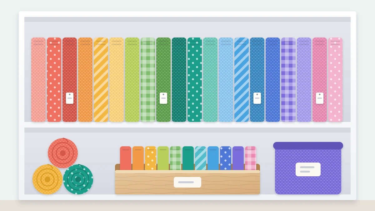A shelf of fabric folded to the same width and filed upright like books in rainbow order, with a box of fat quarters below