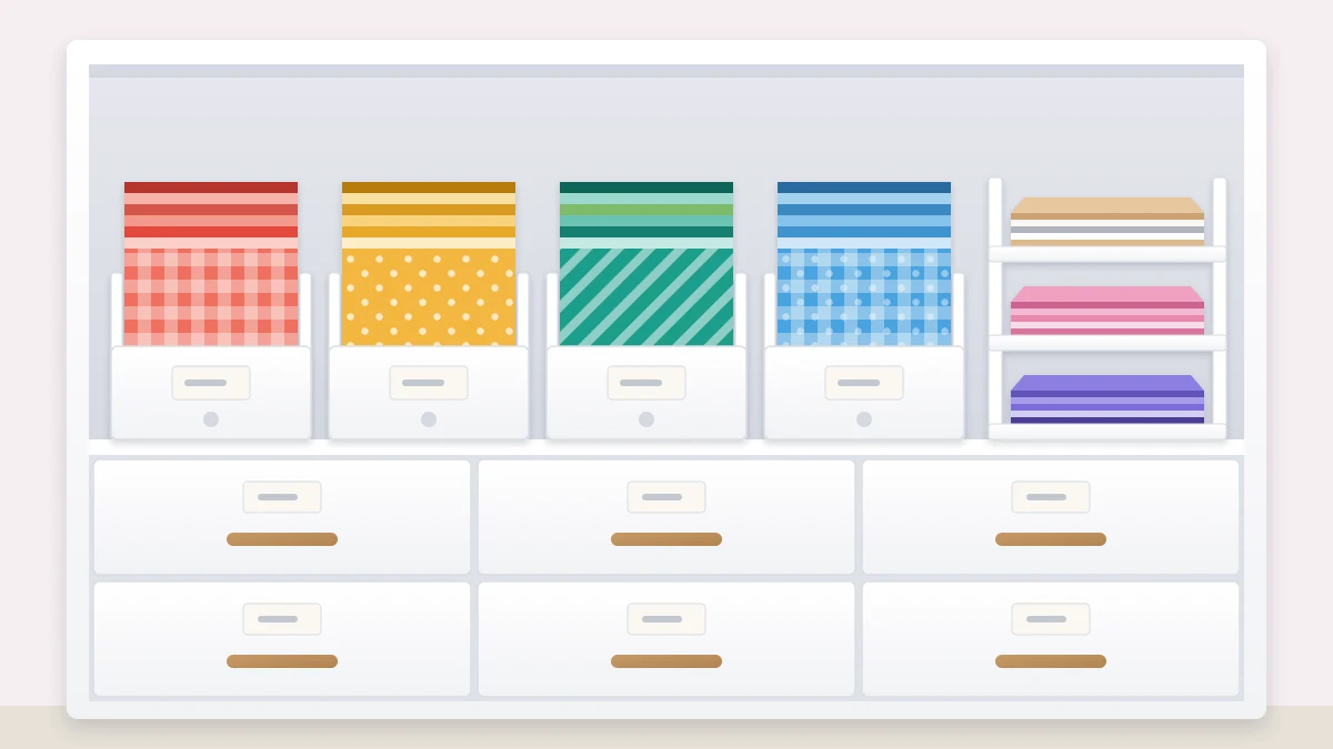 Upright paper holders on a shelf filled with square patterned and solid sheets grouped by color, with a flat stacking tray beside them